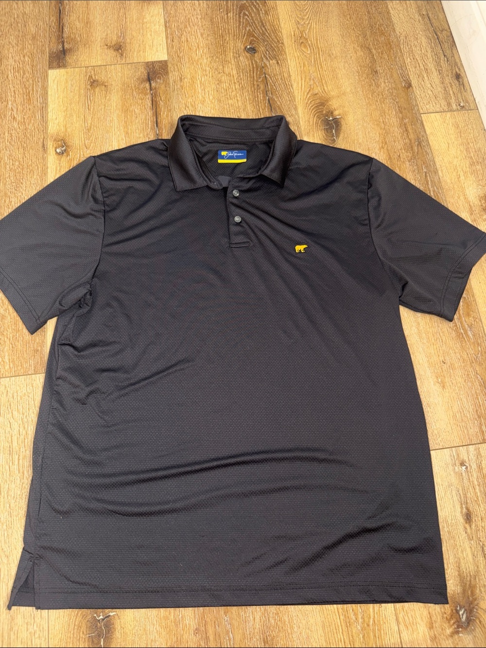 Jack Nicklaus Men's Black Golf Polo with Small Yellow Bear Emblem